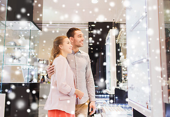 Image showing couple looking to shopping window at jewelry store