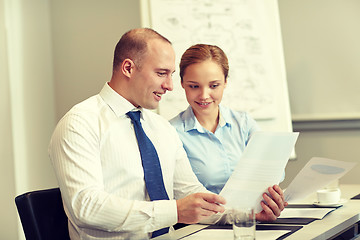 Image showing smiling business people meeting in office