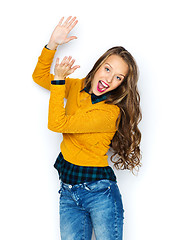 Image showing happy young woman or teen girl applauding