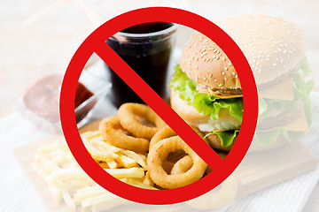 Image showing close up of fast food and drink behind no symbol