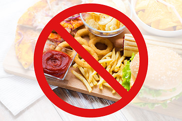 Image showing close up of fast food snacks behind no symbol