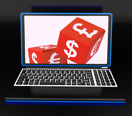 Image showing Currencies Dices On Laptop Showing Global Finances