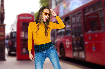 Image showing happy young woman or teen over london city street