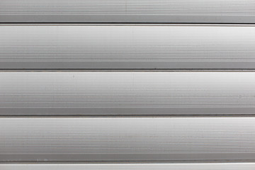 Image showing close up of aluminum metal garage door backdrop