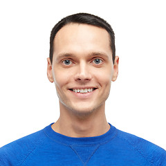 Image showing smiling young man in blue pullover portrait