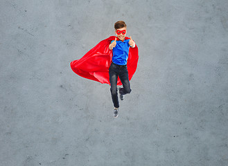 Image showing boy in super hero cape and mask showing thumbs up