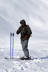 Image showing Skier on top of ski slope at nice day