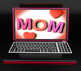 Image showing Mom On Laptop Showing Digital Card