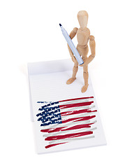 Image showing Wooden mannequin made a drawing - USA