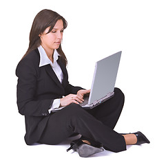 Image showing Businesswoman working on a laptop
