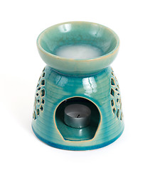 Image showing Candle in oil burner