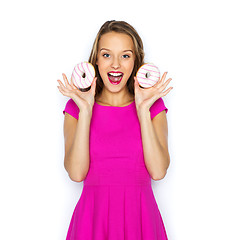 Image showing happy woman or teen girl with donuts