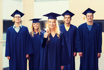 Image showing group of smiling students in mortarboards