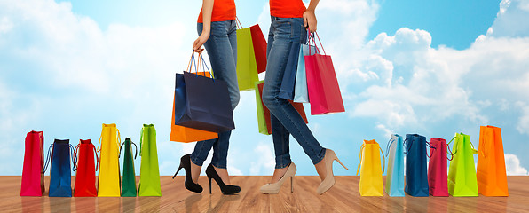 Image showing close up of women with shopping bags