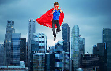 Image showing boy in super hero cape and mask showing thumbs up