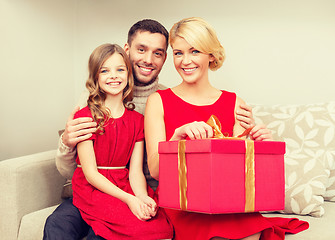 Image showing happy family opening gift box