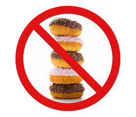 Image showing close up of glazed donuts pile behind no symbol