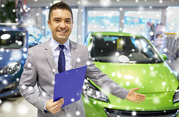 Image showing happy man at auto show or car salon