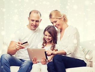 Image showing happy family with tablet pc and credit card