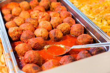 Image showing close up of meatballs and other dishes on tray