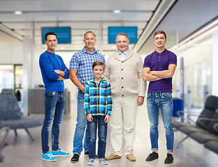 Image showing group of smiling men and boy