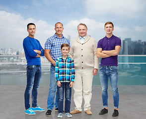 Image showing group of smiling men and boy