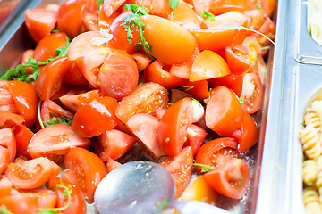 Image showing close up of tomato salad in container