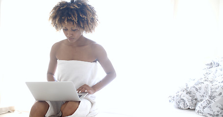 Image showing Young Woman Using Laptop Computer In Her Room