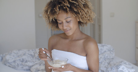 Image showing African American Female Eating Breakfast In Bed