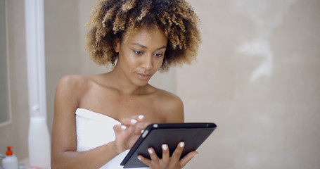 Image showing Girl In Bath Towels Using Touchpad