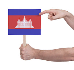 Image showing Hand holding small card - Flag of Cambodia