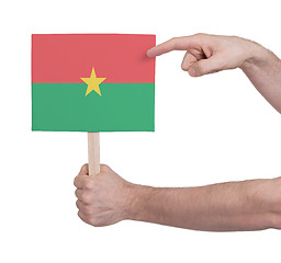 Image showing Hand holding small card - Flag of Burkina Faso