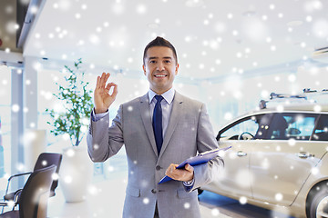 Image showing happy man at auto show or car salon