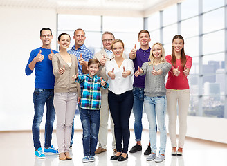 Image showing group of smiling people showing thumbs up