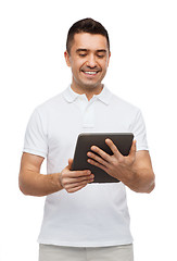 Image showing smiling man with tablet pc computer