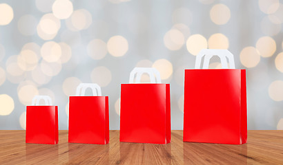 Image showing many blank red shopping bags