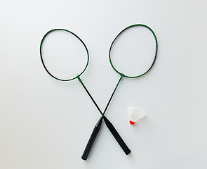 Image showing close up of badminton rackets with shuttlecock