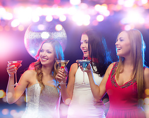 Image showing smiling women with cocktails at night club