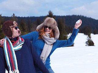 Image showing happy young couple having fun on fresh show on winter vacation