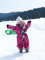 Image showing little baby girl have fun on fresh snow