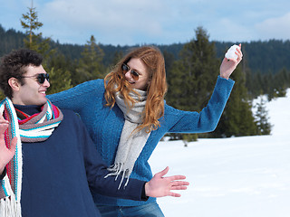 Image showing happy young couple having fun on fresh show on winter vacation