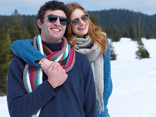 Image showing happy young couple having fun on fresh show on winter vacation