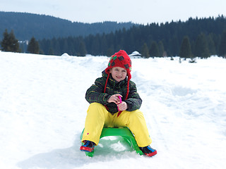 Image showing happy young boy have fun on winter vacatioin on fresh snow