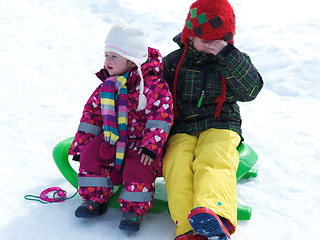 Image showing portrait of boy and baby girl on winter vacation