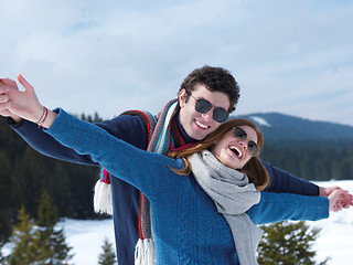 Image showing happy young couple having fun on fresh show on winter vacation