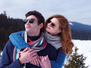 Image showing happy young couple having fun on fresh show on winter vacation