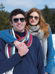 Image showing happy young couple having fun on fresh show on winter vacation