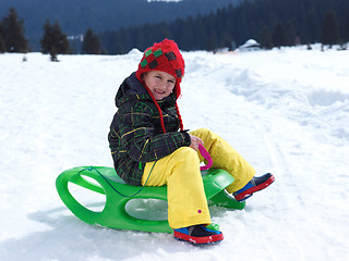 Image showing happy young boy have fun on winter vacatioin on fresh snow