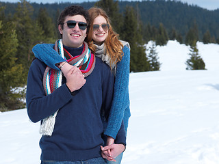 Image showing happy young couple having fun on fresh show on winter vacation