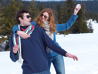 Image showing happy young couple having fun on fresh show on winter vacation